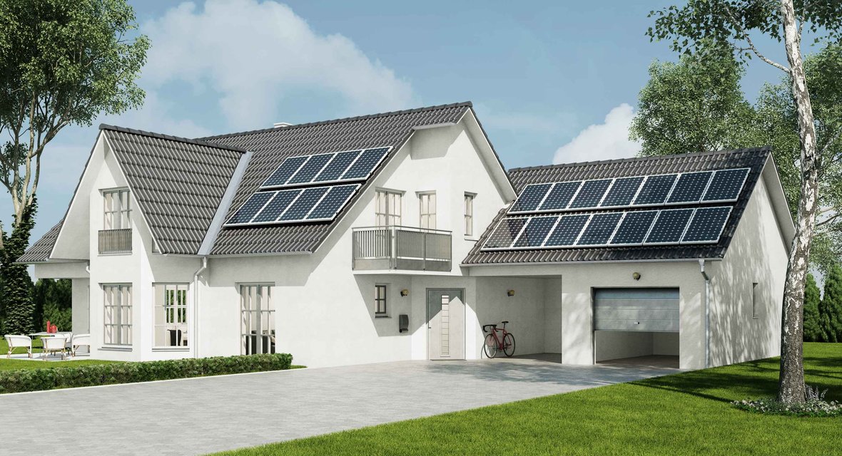 Symbolisches Bild mit Musterhaus mit Photovoltaik auf dem Dach.